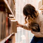 Girl taking a book